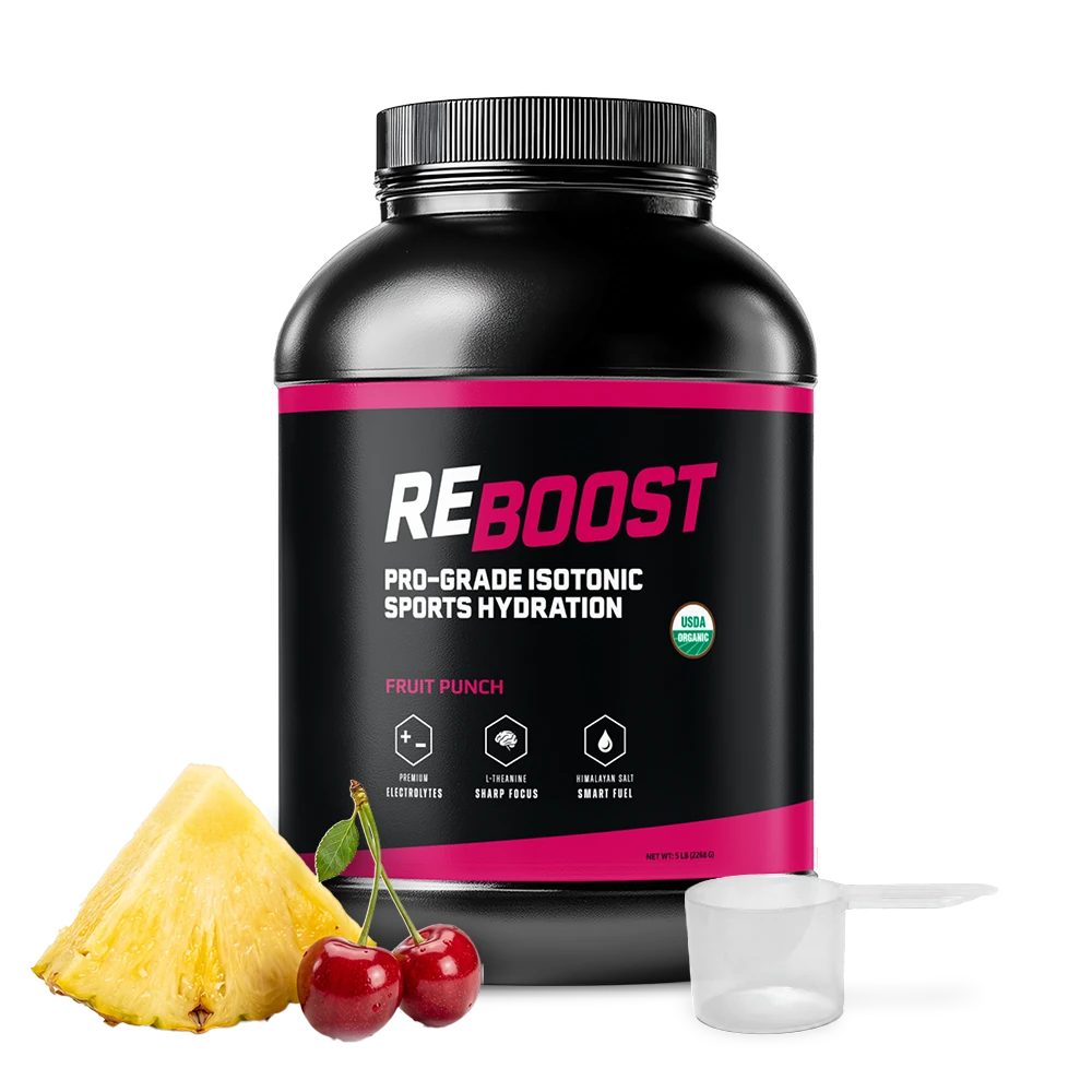 A black plastic tub of REBOOST Pro-Grade Isotonic Sports Hydration in Fruit Punch flavor, shown on a white background with a scoop and pineapple and cherries.