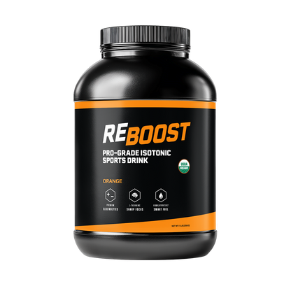 Orange (Electrolyte Powder) with black and orange container of Reboost sports drink on a white background
