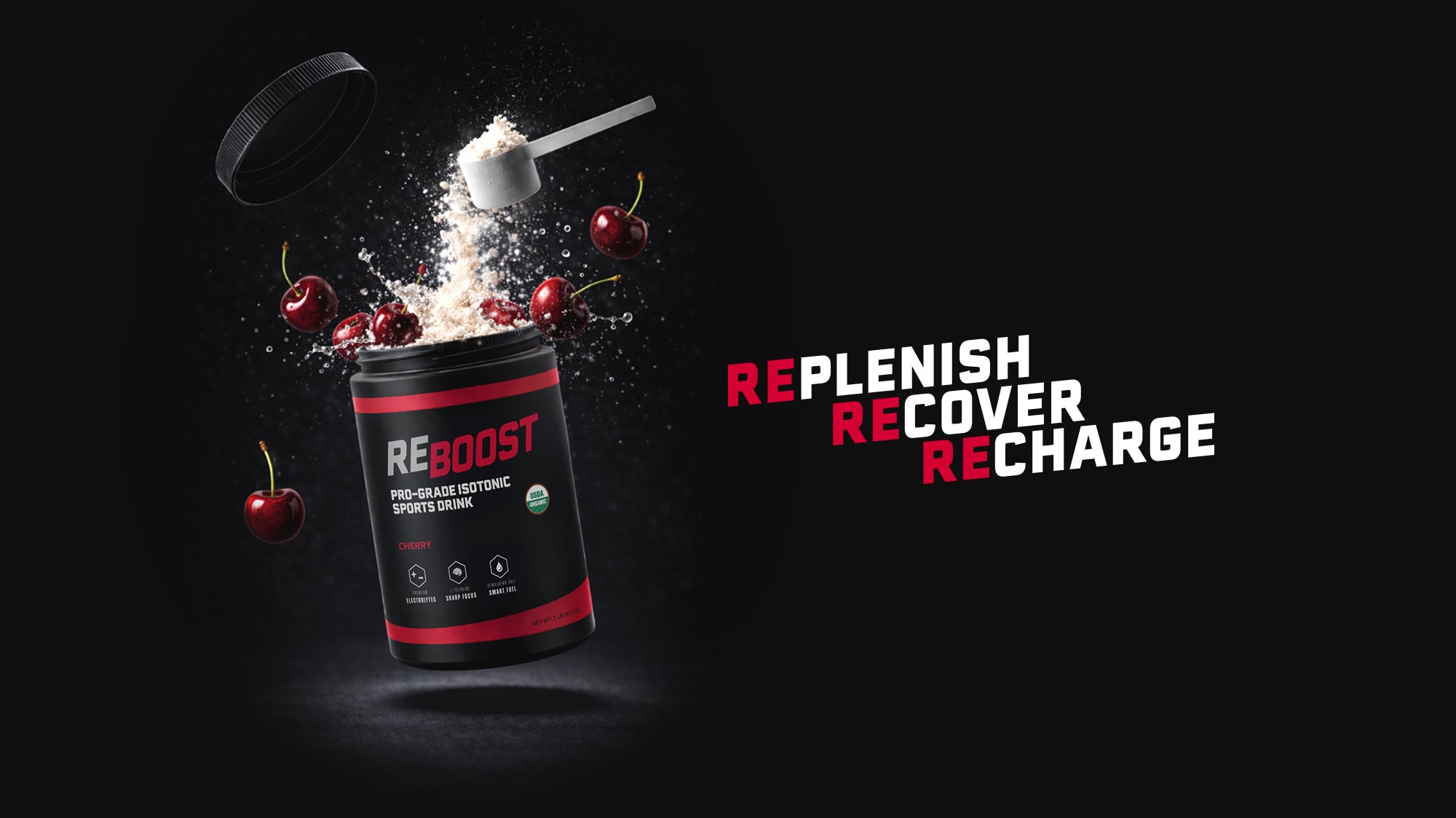 Cherry flavor REBOOST container with powdery substance and orange slices on a dark background.