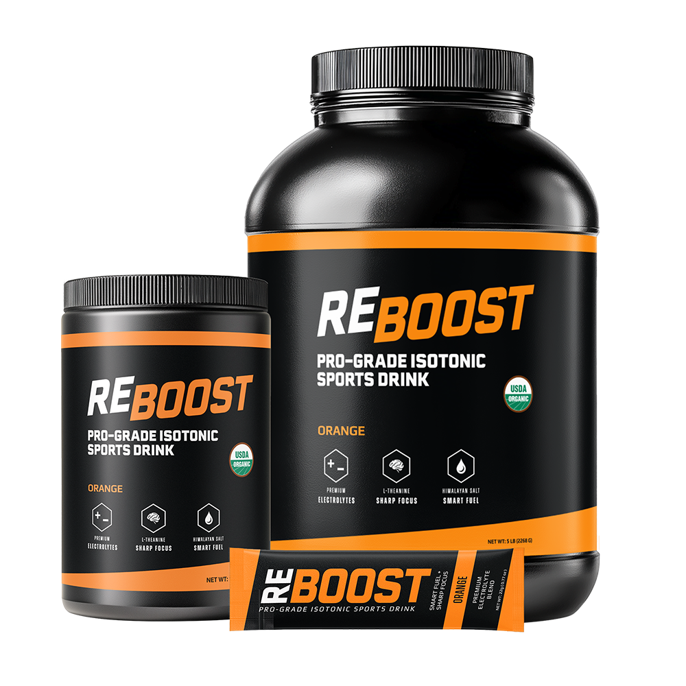 Two bottles of Orange (Electrolyte Powder) Reboost sports drink on a white background